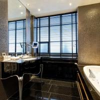 Трехместный (Трехместный номер Делюкс с видом на канал и гидромассажной ванной - Частный дом) отеля The Toren, Амстердам