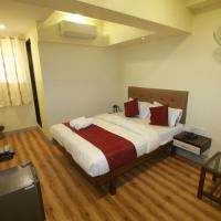 Двухместный (Двухместный номер Делюкс с 1 кроватью (для 2 взрослых и 1 ребенка)) отеля Hotel Alfa International, Мумбай