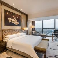 Двухместный (Deluxe River View Room (King Bed)) отеля Minyoun Chengdu Kehua Hotel, Чэнду