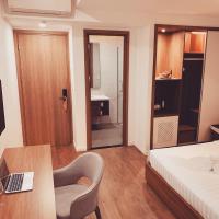 Двухместный (Двухместный номер Делюкс с 1 кроватью и видом на город) отеля Royal Dragon Boutique Hotel, Хошимин