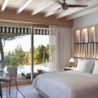 Номер (Бунгало с видом на бассейн и море) отеля Four Seasons Astir Palace Hotel Athens, Афины