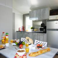 Номер (Mobil home Plaisance 5/7 personnes) кемпинга Camping Les Peupliers, Ре