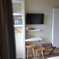 Двухместный (Небольшой двухместный номер с 2 отдельными кроватями) отеля Alp Hotel, Амстердам