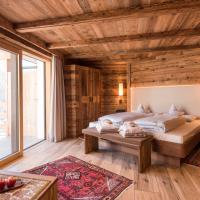 Сьюит (Суперлюкс) отеля Charmehotel Uhrerhof - Deur, Ортизеи