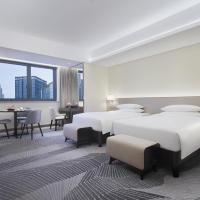 Двухместный (Двухместный номер Делюкс с 2 отдельными кроватями) отеля Harbour Plaza Chongqing, Чунцин