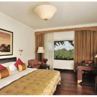 Четырехместный (Deluxe Room Various View  King Bed) отеля Taj Bengal, Калькутта