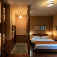 Семейный (Семейный номер с балконом) загородного отеля Yangshuo Moondance Hotel, Яншо