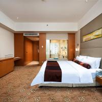 Двухместный (Номер Делюкс с кроватью размера «king-size») отеля Jinling Hotel Wuxi, Уси