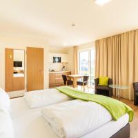 Апартаменты (Апартаменты с балконом) апарт-отеля INhouse - Wohnen auf Zeit, Ингольштадт