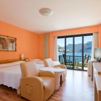 Трехместный (Стандартный трехместный номер с балконом, вид на озеро) отеля Hotel Nassa Garni, Лугано