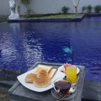 Двухместный (Двухместный номер Делюкс с 1 кроватью) семейного отеля Pandawa Beach Homestay, Улувату