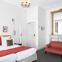 Двухместный (Улучшенный двухместный номер с 2 отдельными кроватями) отеля Bradford Elysées - Astotel, Париж