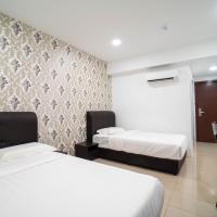 Трехместный (Улучшенный трехместный номер) отеля Crystal Garden Hotel (Tasik Selatan), Куала-Лумпур