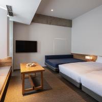 Семейный (Superior Quadruple: 2 single bed and 1 double bed) хостела THE SHARE HOTELS TSUGU KYOTO SANJO, Киото