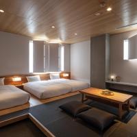 Четырехместный (Superior triple with tatami area) хостела THE SHARE HOTELS TSUGU KYOTO SANJO, Киото