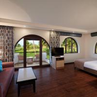 Двухместный (Номер Делюкс с кроватью размера «king-size» и видом на сад, для некурящих) курортного отеля Holiday Inn Resort Goa, Кавелоссим