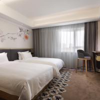 Двухместный (Executive Twinbed Room) отеля Paco Business Hotel Jiangtai Metro Station Branch, Гуанчжоу