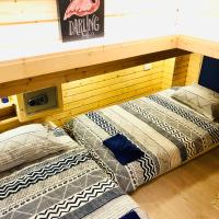 Двухместный (Twin Room with Shared Bathroom and Toilet (2 futons)) хостела Blu Cabin Gay Poshtel, Бангкок