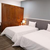 Двухместный (Двухместный номер с 2 отдельными кроватями, вид на сад) семейного отеля La Habana House, Хюэ