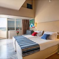 Сьюит (Суперлюкс с видом на море (для 2 взрослых и 2 детей)) отеля Kyma Suites Beach Hotel, Ретимно, Крит