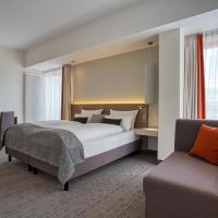 Семейный (Семейный номер (для 2 взрослых и 2 детей)) отеля Günnewig Kommerz Hotel by Centro, Кельн