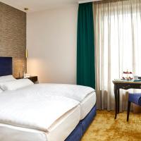 Двухместный (Двухместный номер Делюкс с 1 кроватью) отеля Carathotel Düsseldorf Carlsplatz, Дюссельдорф