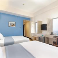 Четырехместный (Queen Room with 2 Queen Beds, Bay View, Non-Smoking) отеля Microtel by Wyndham Mall of Asia, Манила