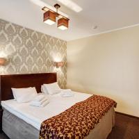 Семейный (Семейный люкс с балконом) отеля Narva-Jõesuu Medical Spa, Нарва Йыэсуу