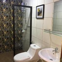 Четырехместный (Четырехместный номер эконом-класса) отеля Mountain View Garden Inn Coron, Корон