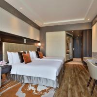 Двухместный (Deluxe Room Twin Bed (3 Hrs early check in/late check out upon availability and 10% Disc. on Food and Soft beverages, valid for stays till 31st Oct'20)) отеля Radisson Blu Agra Taj East Gate, Агра