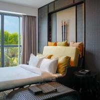 Двухместный (Семейный номер Делюкс с видом на бассейн (с диваном-кроватью)) курортного отеля The Sakala Resort Bali – All Suites, Нуса Дуа