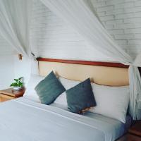 Двухместный (Улучшенный двухместный номер с 1 кроватью или 2 отдельными кроватями и видом на сад) гостевого дома Puri Padi, Убуд