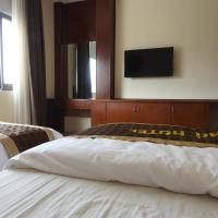 Двухместный (Двухместный номер с 1 кроватью и балконом (для 2 взрослых и 1 ребенка)) отеля An Phu Nguyen Hoang Hotel, Ханой