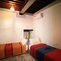 Четырехместный (Улучшенный четырехместный номер) отеля Riad Mouna, Фес