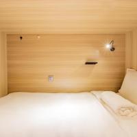 Номер (Кровать в общем 6-местном номере для мужчин и женщин) хостела Sanya Backpacker International Youth Hostel, Санья