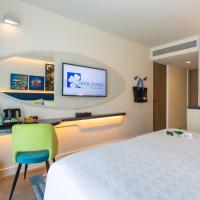 Двухместный (Улучшенный номер с балконом) отеля Surf Hotel Patong, Пхукет