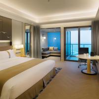 Двухместный (Номер с видом на море и кроватью размера "queen-size" или 2 односпальными кроватями) отеля Holiday Inn Haikou West Coast, Хайкоу