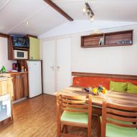 Номер (Mobile Home Loggia (6 Adults)) кемпинга Camping Les Peupliers, Ре