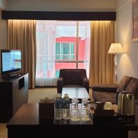 Сьюит (Executive Suite with Complimentary Airport Shuttle) отеля Pan Borneo Hotel Kota Kinabalu, Кота-Кинабалу