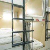 Номер (Общий номер для мужчин и женщин) капсульного отеля Central 65 Hostel, Сингапур (город)