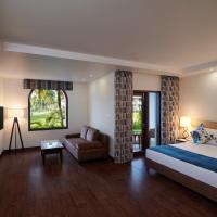 Двухместный (Номер Делюкс с кроватью размера «king-size» и видом на сад, для некурящих) курортного отеля Holiday Inn Resort Goa, Кавелоссим