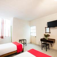 Четырехместный (Стандартный четырехместный номер) отеля Hotel El Angel, Леон (Штат Гуанахуато)