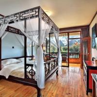 Двухместный (Улучшенный номер с кроватью размера «queen-size» и видом на реку) отеля Yangshuo Mountain Retreat, Яншо