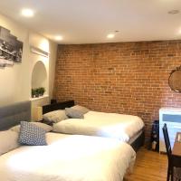 Апартаменты (Номер-студио Делюкс с 2 двуспальными кроватями) апарт-отеля The Nomad Suites, Нью-Йорк