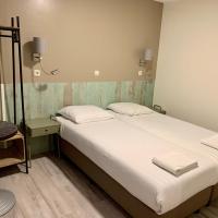 Двухместный (Двухместный номер с 2 отдельными кроватями) отеля Hotel Damrak Inn, Амстердам