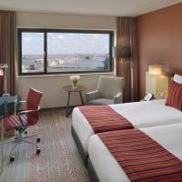 Двухместный (Представительский двухместный номер с 2 отдельными кроватями) отеля Mövenpick Hotel Amsterdam City Centre, Амстердам