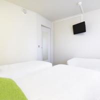 Трехместный (Трехместный номер с 3 односпальными кроватями (для 3 взрослых)) отеля Campanile Paris Est - Porte de Bagnolet, Париж