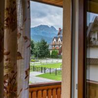 Семейный (Семейный люкс с балконом) отеля Pensjonat Nowita, Закопане