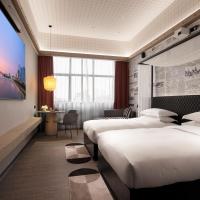 Двухместный (Двухместный номер Делюкс с 2 отдельными кроватями) отеля Paco Business Hotel Zhujiang New Town Branch, Гуанчжоу