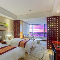 Двухместный (Улучшенный двухместный номер с 2 отдельными кроватями) отеля Ming Guang International Grand Hotel Haikou, Хайкоу